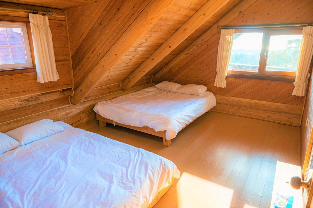 Jungmun Log Pension&Resort Seogwipo Extérieur photo